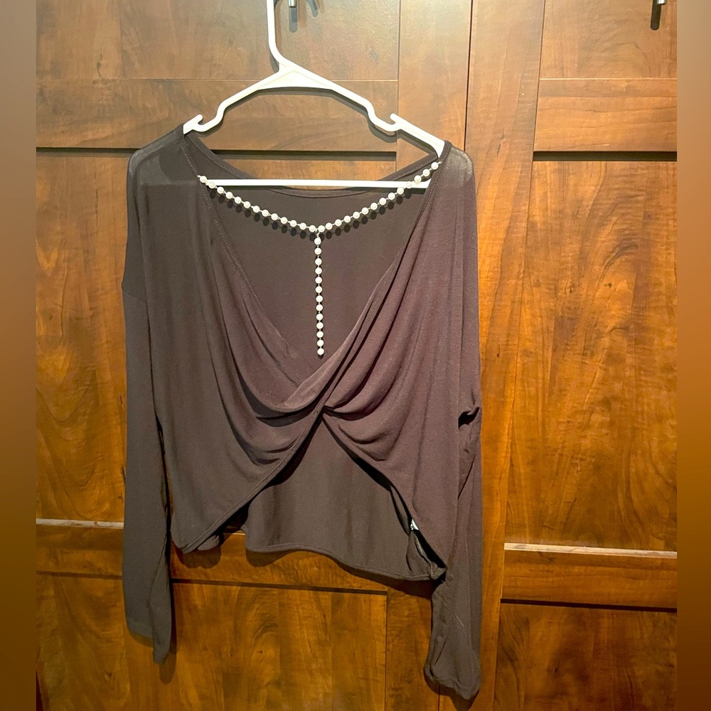 Open back black blouse with pearl detail